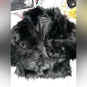 Furry black coat ( matches furry boots on my page lol ) fashion nova